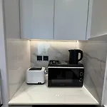 Cozy 1Br Wood & Beige Retreat In Jvc